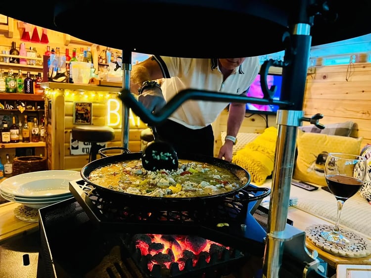 cooking paella in an arctic cabin