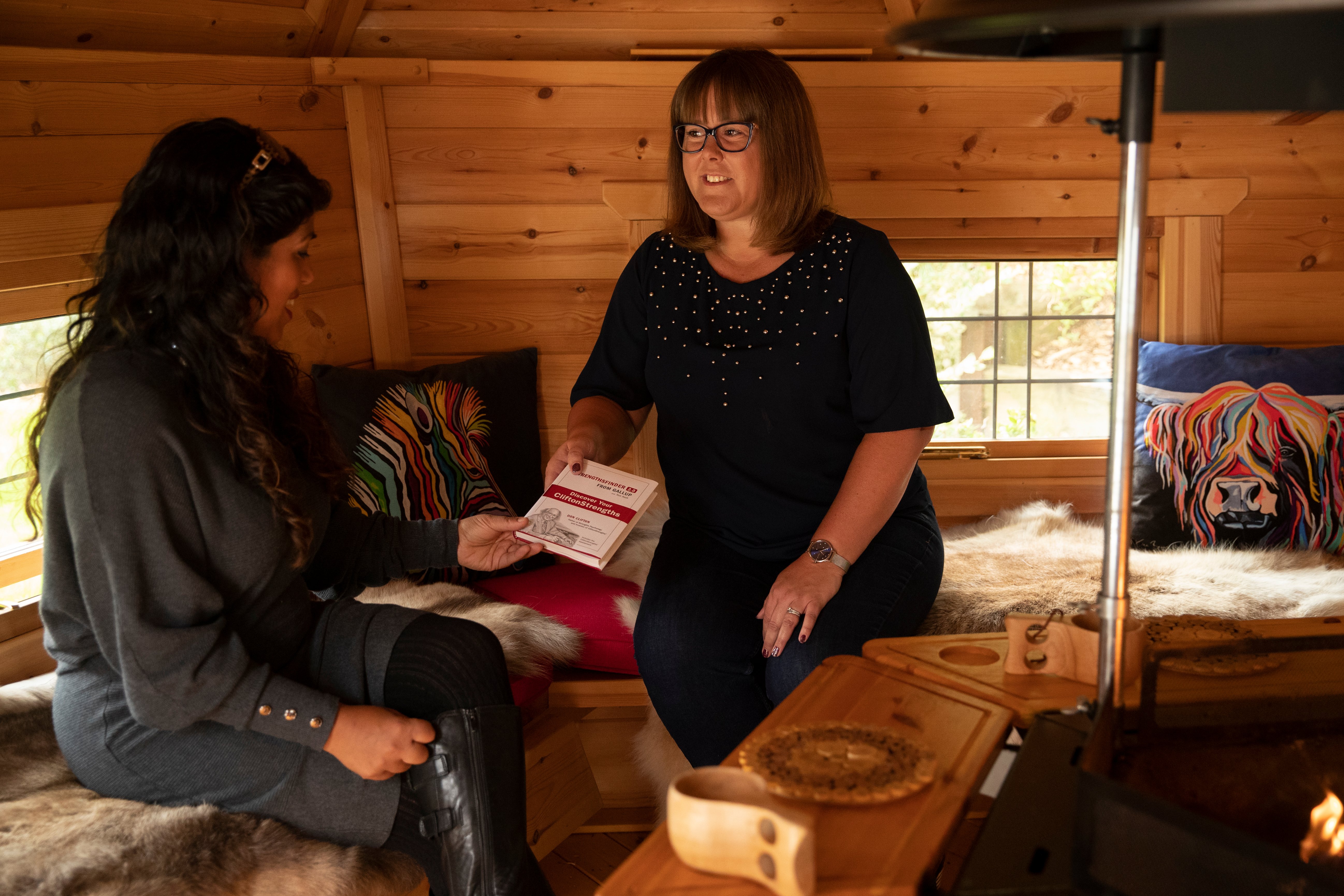 Arctic Cabins Timber Cabin Therapy Room with two women talking