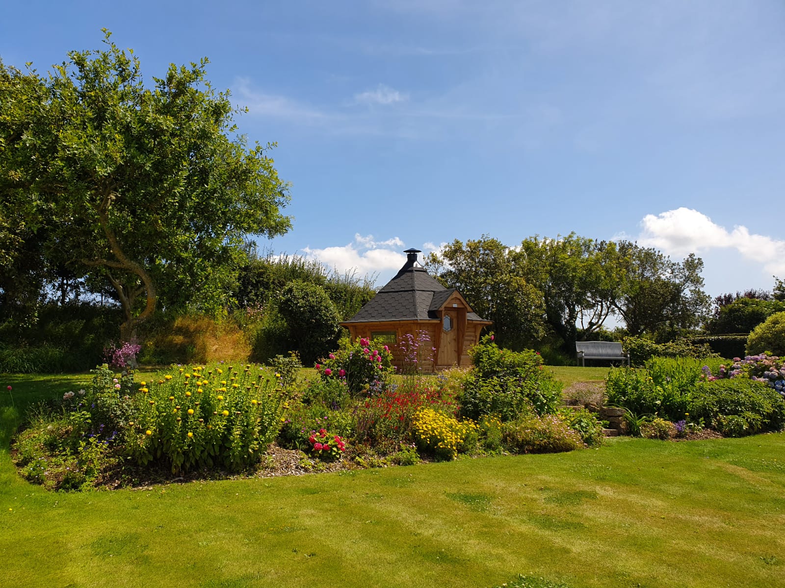 Arctic Cabin in an English country garden, summer