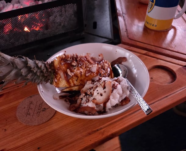 Grilled pineapple with rum caramel sauce and homemade coconut ice cream
