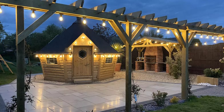 large bbq cabin on tiles patio area