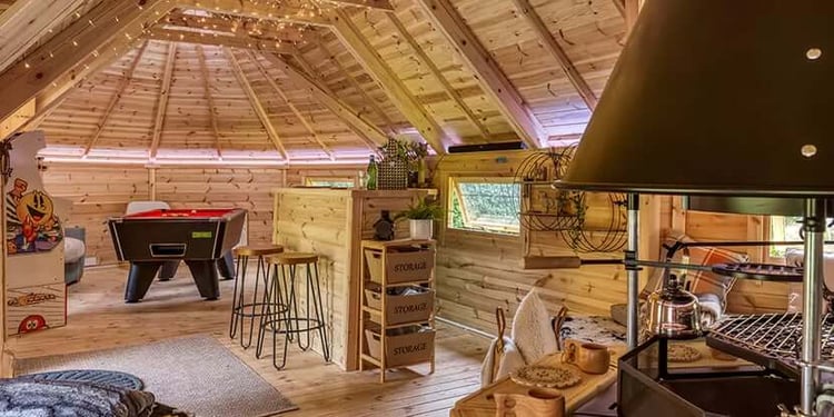 inside a large arctic garden bar with pool table
