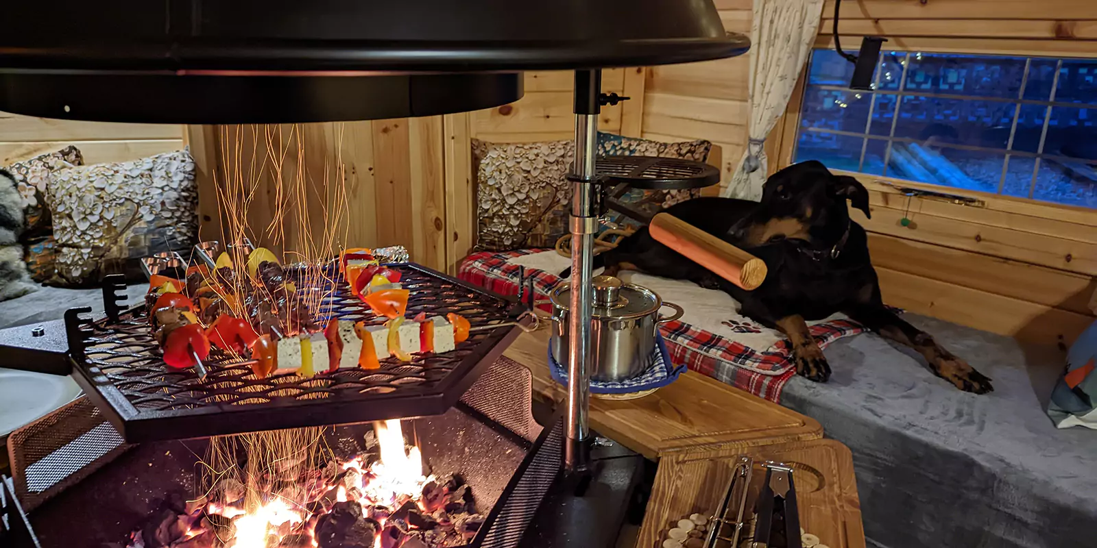 bbq skewers being cooked over flames